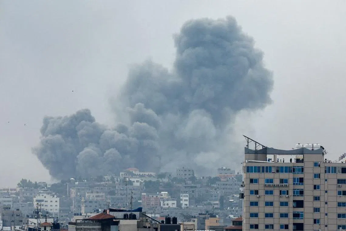 Smoke rises following Israeli strikes in Gaza, October 9, 2023. REUTERS/Mohammed Salem