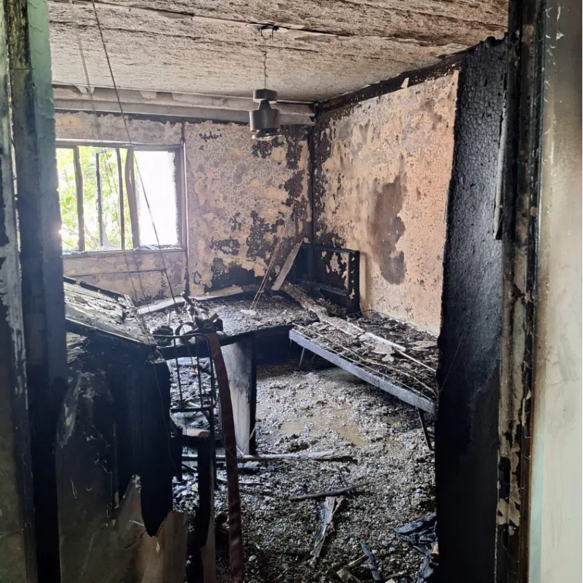 A bedroom in a second-floor unit was on fire when SCDF arrived.