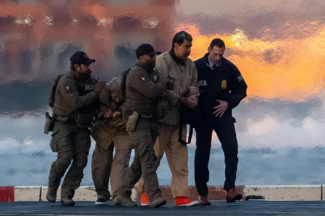 Captured Venezuelan President Nicolas Maduro and his wife Cilia Flores being escorted to a courthouse in New York on Jan 5.