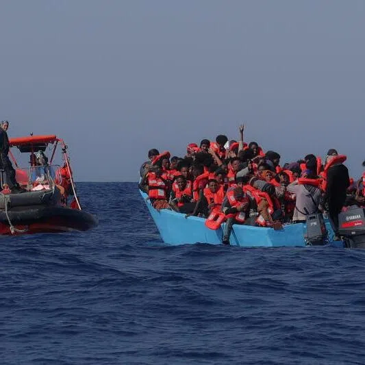 Migrants aboard an overcrowded boat during a rescue operation in the central Mediterranean, off Libya, on Aug 11, 2025.