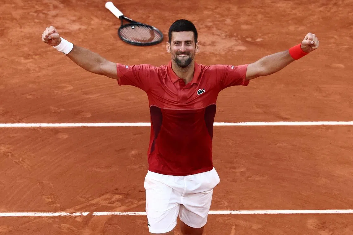 Tennis - French Open - Roland Garros, Paris, France - June 3, 2024 Serbia's Novak Djokovic celebrates after winning his fourth round match against Argentina's Francisco Cerundolo REUTERS/Yves Herman