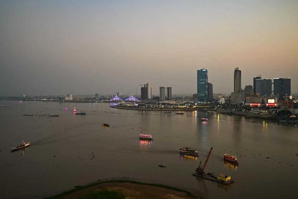 ST20240221-202447705151-Lim Yaohui-Tan Hui Yee-hymekong/
(PLEASE DO NOT USE THIS PICTURE. IT IS FOR HUI YEE'S STORY IN LATE APRIL, 2024)
Confluence of Mekong River (left) and Tonle Sap River (right) as viewed from Tonle Sap Bar at Sokha Phnom Penh Hotel on Feb 25, 2024. 
Many doomsday stories exist about the Mekong River. This package aims to take a more holistic view by showcasing the people and communities fighting to save it.
The longstanding issues – damming of the river, blocked passage of fish, land erosion because there is not enough sediment and nutrients flowing downstream – need to be understood in the context of the global and regional shift towards renewable energy and “clean” energy.
Singapore electricity companies are importing and/or have plans to import hydropower from Laos and Cambodia. Singapore’s net zero ambition is inextricably linked to the Mekong River and its tributaries.
But this is not an either-or debate. The story will talk about all the competing needs for the Mekong River and discuss ways in which local communities have tried to imagine a new and better future for the waterway.
Already, we are seeing some successes: Discovery of the world’s largest freshwater stingray in the Mekong, the birth of new Irrawaddy dolphins in the parts of the Mekong tributaries under Cambodian stewardship.
(ST PHOTO: LIM YAOHUI)