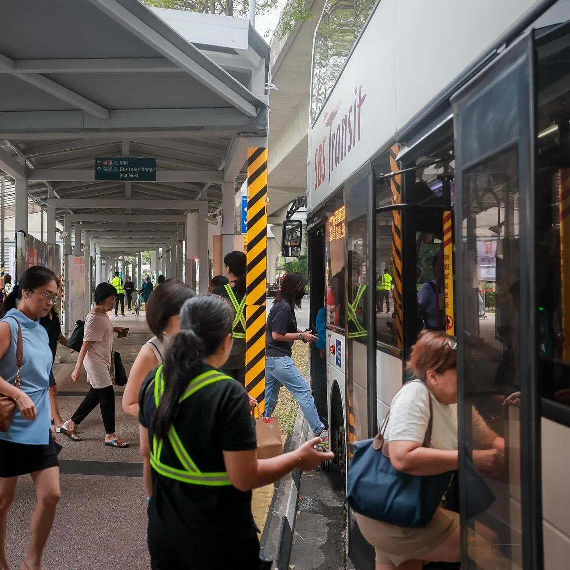 Commuters queue and board shuttle bus service 37A at Upper Serangoon Road above NEL’s Serangoon MRT Station on Jan 28, 2026. There is a service adjustment between Mountbatten and Paya Lebar MRT stations on the Circle Line from 17 January to 19 April 2026.