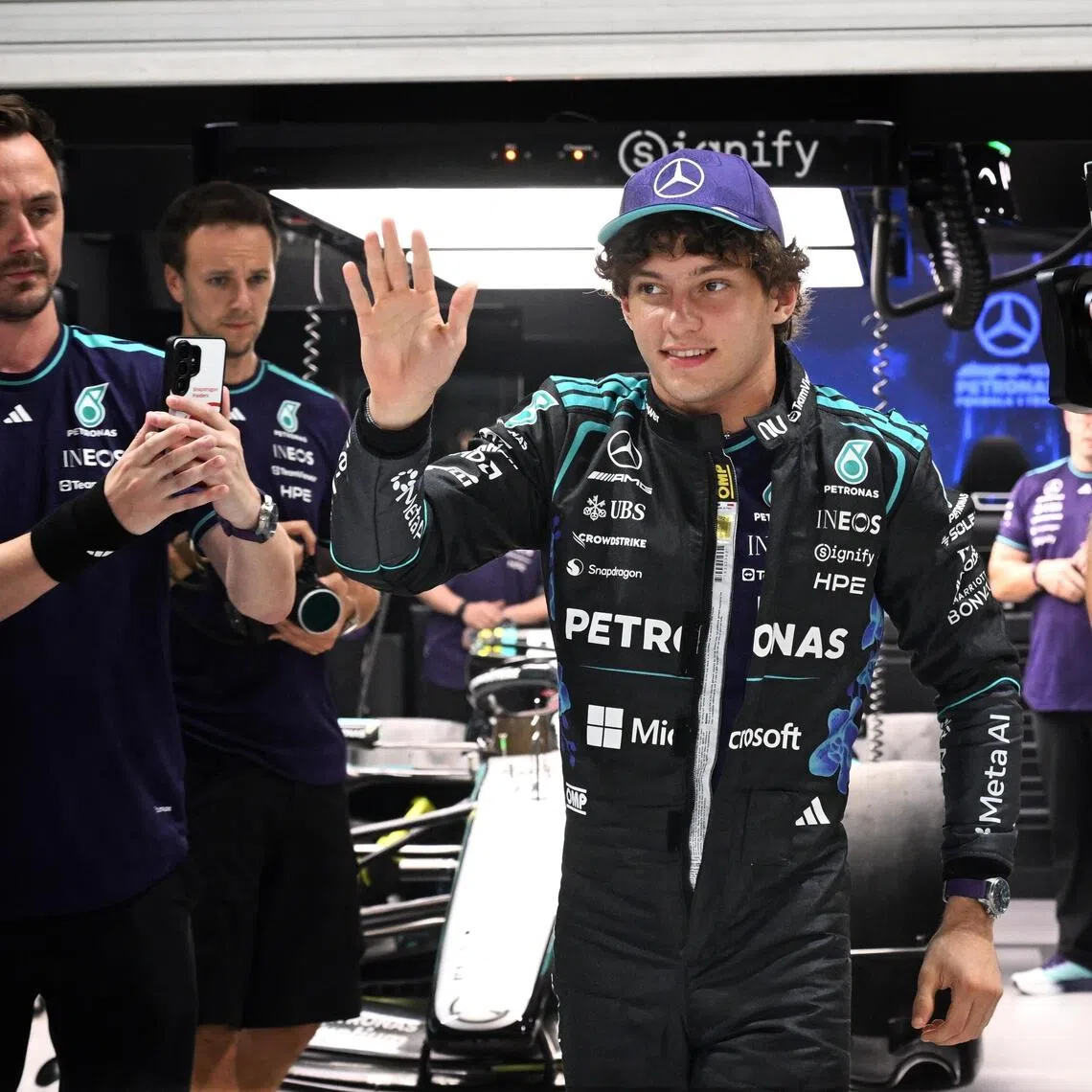 Italian driver Kimi Antonelli of Mercedes-AMG PETRONAS F1 Team waving to his fans at the F1 Pit Lane Experience on Oct 8.