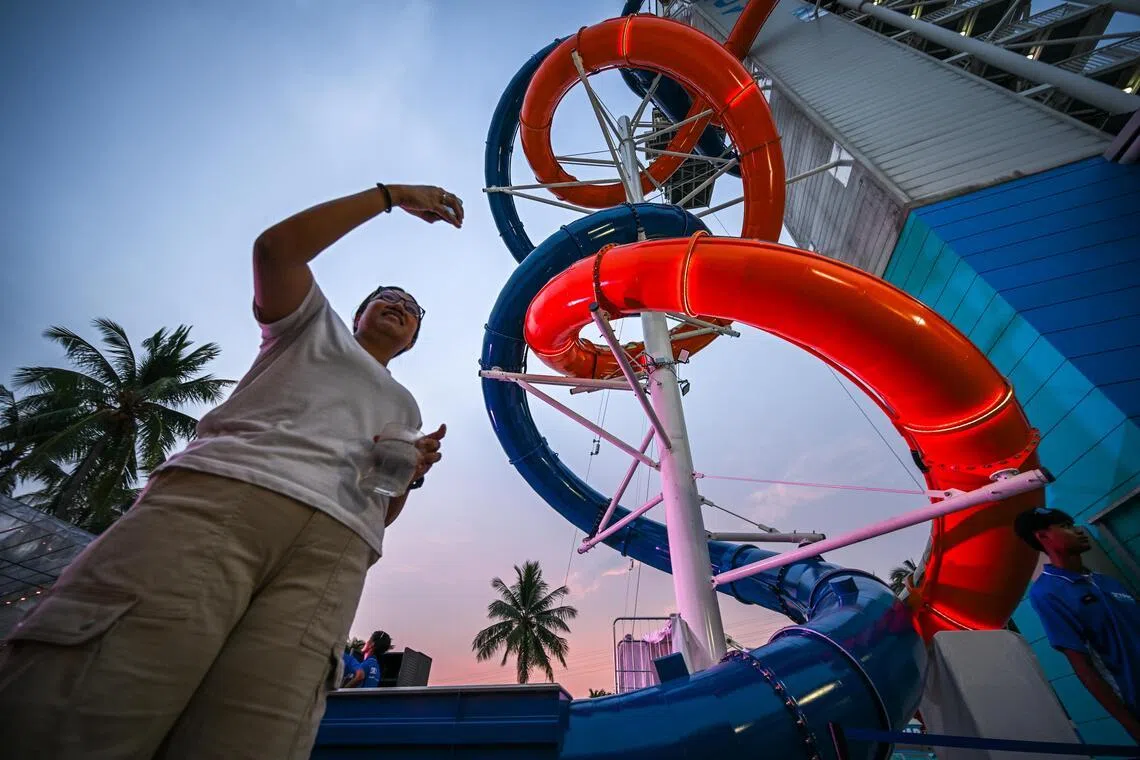 The dry slides have been built around the park’s existing infrastructure, with both slides intertwining around its bungee tower.