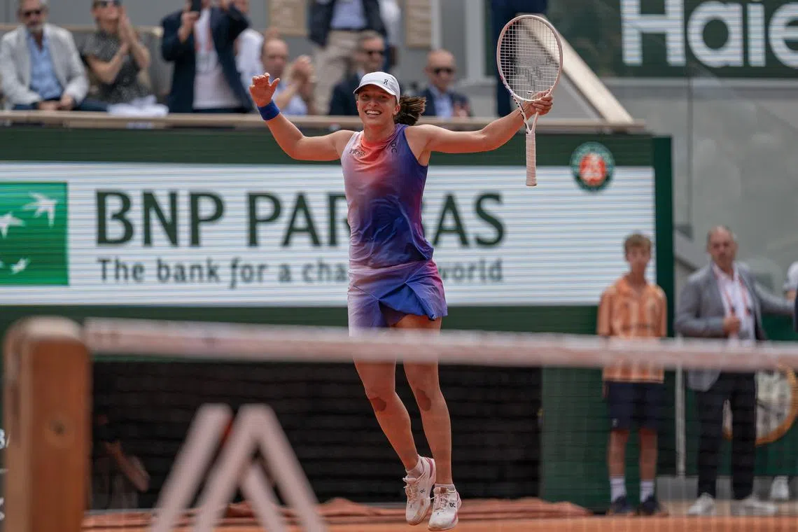 FILE PHOTO: Jun8, 2024; Paris, France; Iga Swiatek of Poland celebrates winning the women's singles final match against Jasmine Paolini of Italy on day 14 of Roland Garros at Stade Roland Garros. Mandatory Credit: Susan Mullane-USA TODAY Sports
