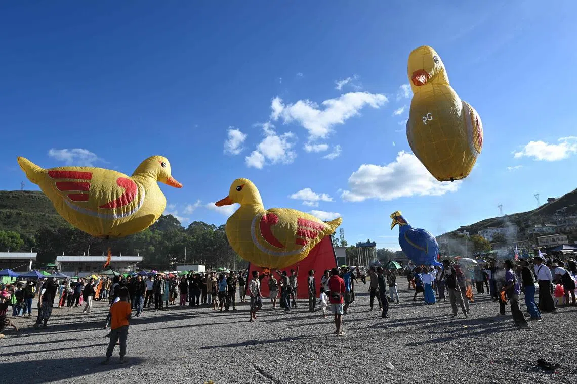 Bird-shaped hot-air balloons are released during the Tazaungdaing Lighting Festival in Taunggyi in Myanmar's north-eastern Shan State on Oct 31. 