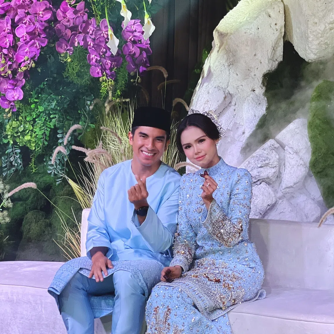 Newly weds, Muar MP Syed Saddiq Syed Abdul Rahman and singer-actress Bella Astillah at their public wedding reception in Muar on Oct 25.