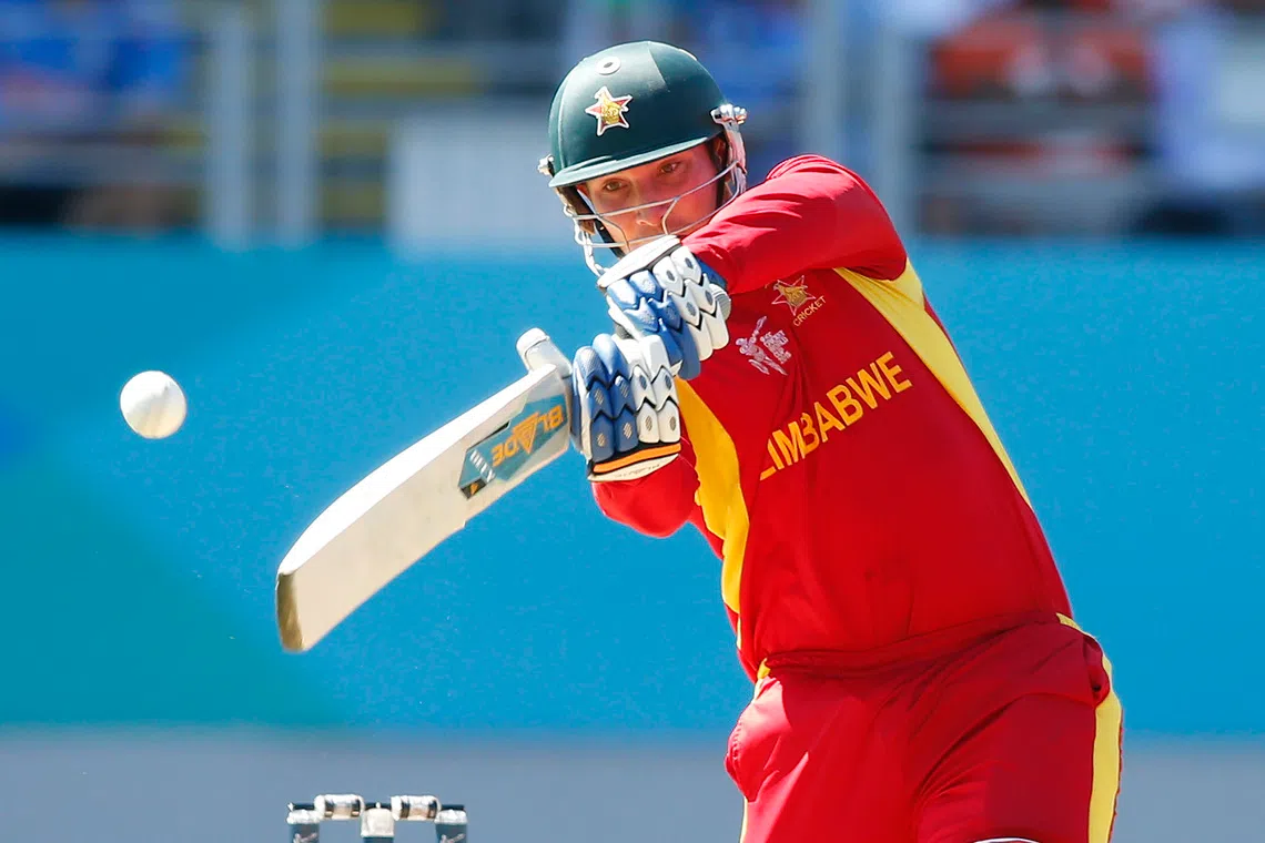 Zimbabwe's Brendan Taylor hits a four during their Cricket World Cup match against India at Eden Park in Auckland, March 14, 2015. REUTERS/Nigel Marple
