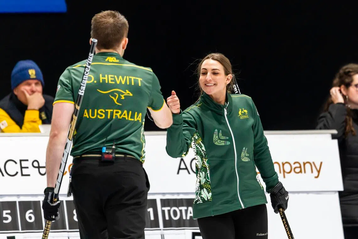 Tahli Gill and Dean Hewitt lift Australia to first world curling title