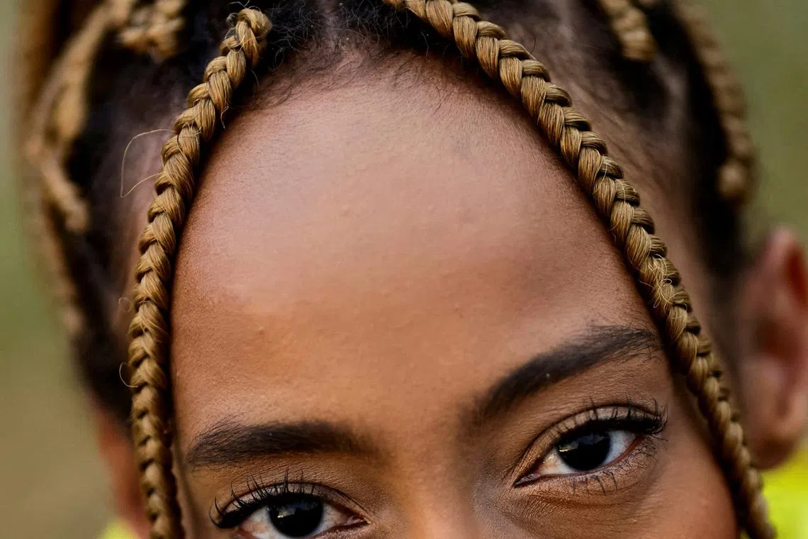 Ana Cardoso taking part in a march against police violence towards the Black community and for Mae Bernadete Pacifico, a Black community activist who was killed in Bahia on Aug 17, in Brasilia, Brazil, Aug 24.