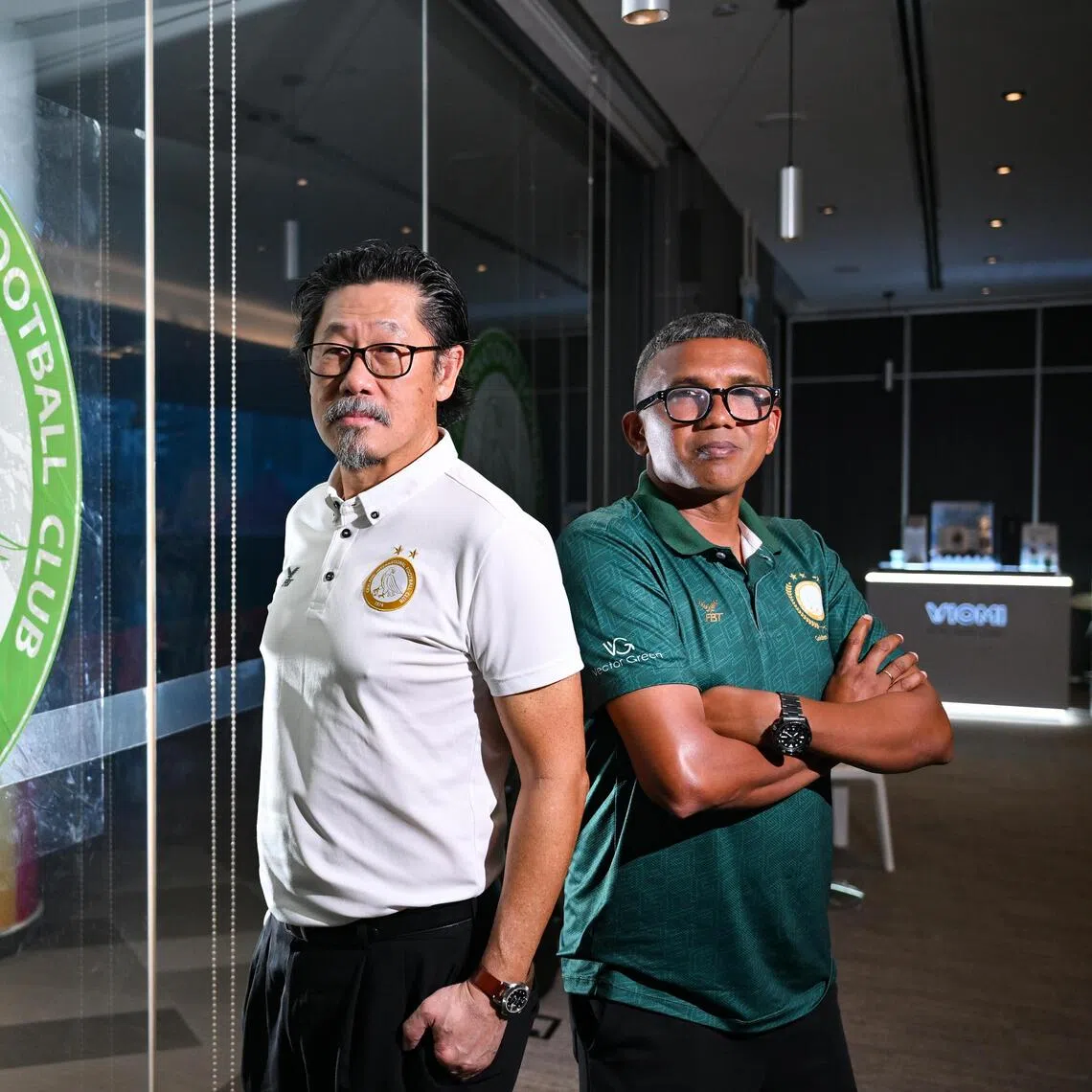 Chairman Desmond Gay (left) with head coach Noor Ali during the Geylang International FC meet and greet session for the upcoming Singapore Premier League season at Our Tampines Hub on Aug 5.