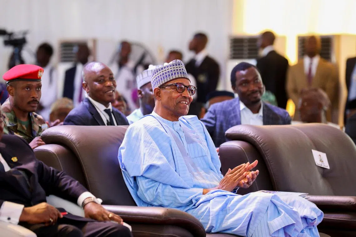 FILE PHOTO: Nigeria's President Muhammadu Buhari attends the commissioning of Dangote Petroleum refinery in Ibeju-Lekki, Lagos, Nigeria May 22, 2023. REUTERS/Temilade Adelaja/File Photo