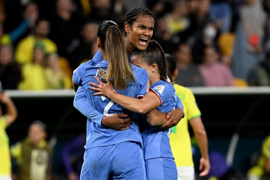 France defender Wendie Renard celebrates scoring her team's second goal during the 2-1 Women's World Cup win over Brazil.