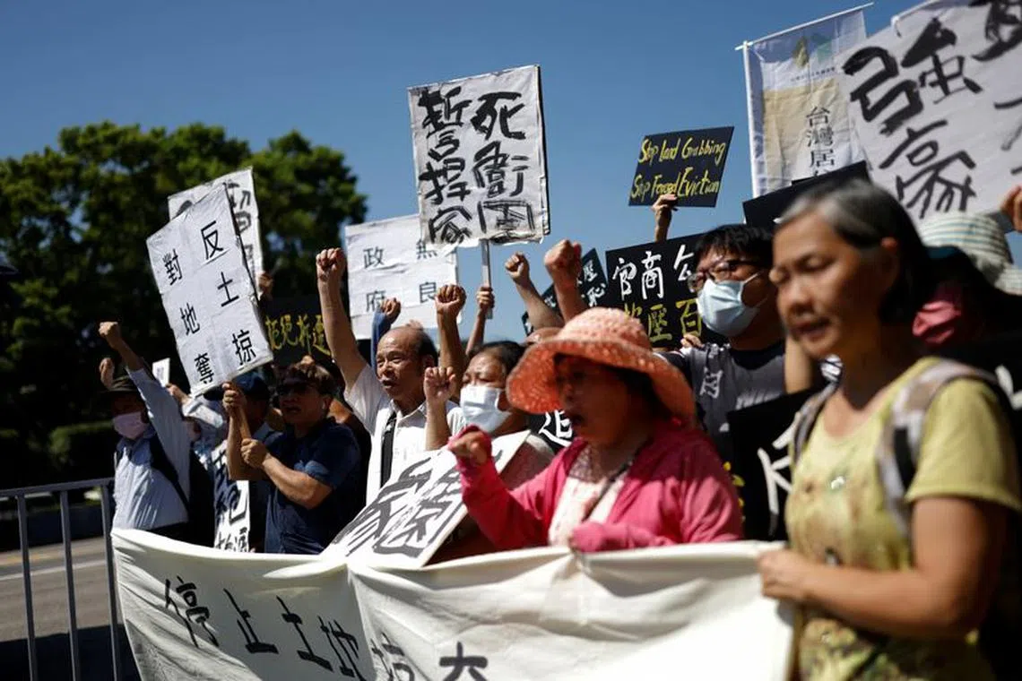 Longtan residents take part in a protest against the expansion of an industrial park for advanced chip manufacturing in Taoyuan, near the presidential office in Taipei, Taiwan September 12, 2023. REUTERS/Carlos Garcia Rawlins