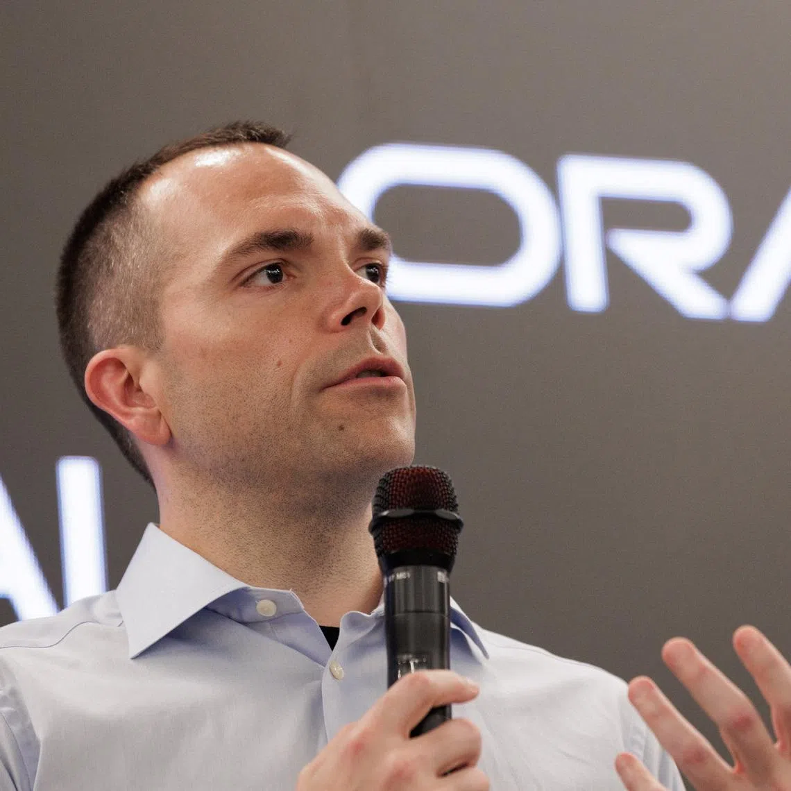 Oracle CEO Clay Magouyrk speaks at a Q&A following a tour of the OpenAI data center in Abilene, Texas, U.S., September 23, 2025.  REUTERS/Shelby Tauber/Pool