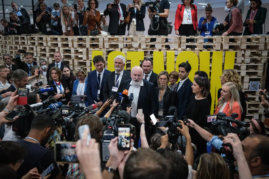Members of the media listen as the European Union's climate chief Frans Timmermans (centre) speaks at the COP27 climate talks in Sharm El-Sheikh, Egypt, on Nov 19, 2022.  He said "the EU would rather have no decision than a bad decision”.