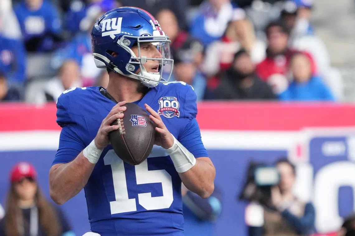 Nov 24, 2024; East Rutherford, New Jersey, USA; New York Giants quarterback Tommy DeVito (15) controls the ball against the Tampa Bay Buccaneers during the first half at MetLife Stadium. Mandatory Credit: Robert Deutsch-Imagn Images/ File Photo