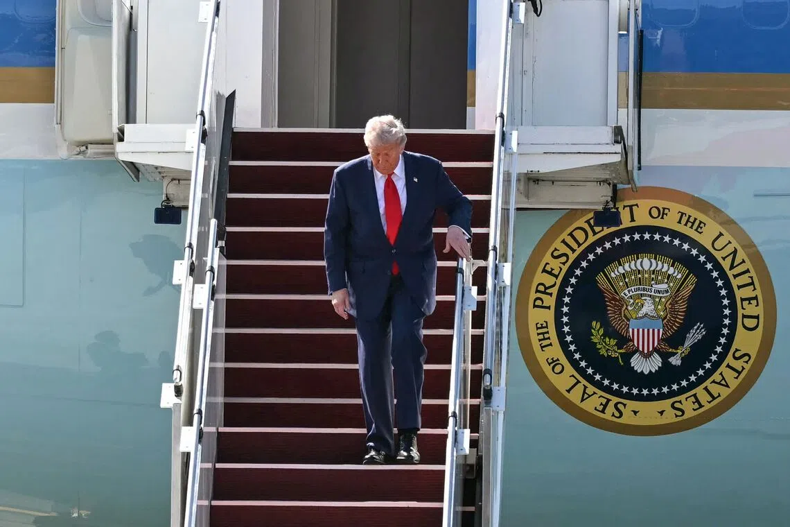 ‘Peace President’ Trump lands in Kuala Lumpur as protests erupt over visit