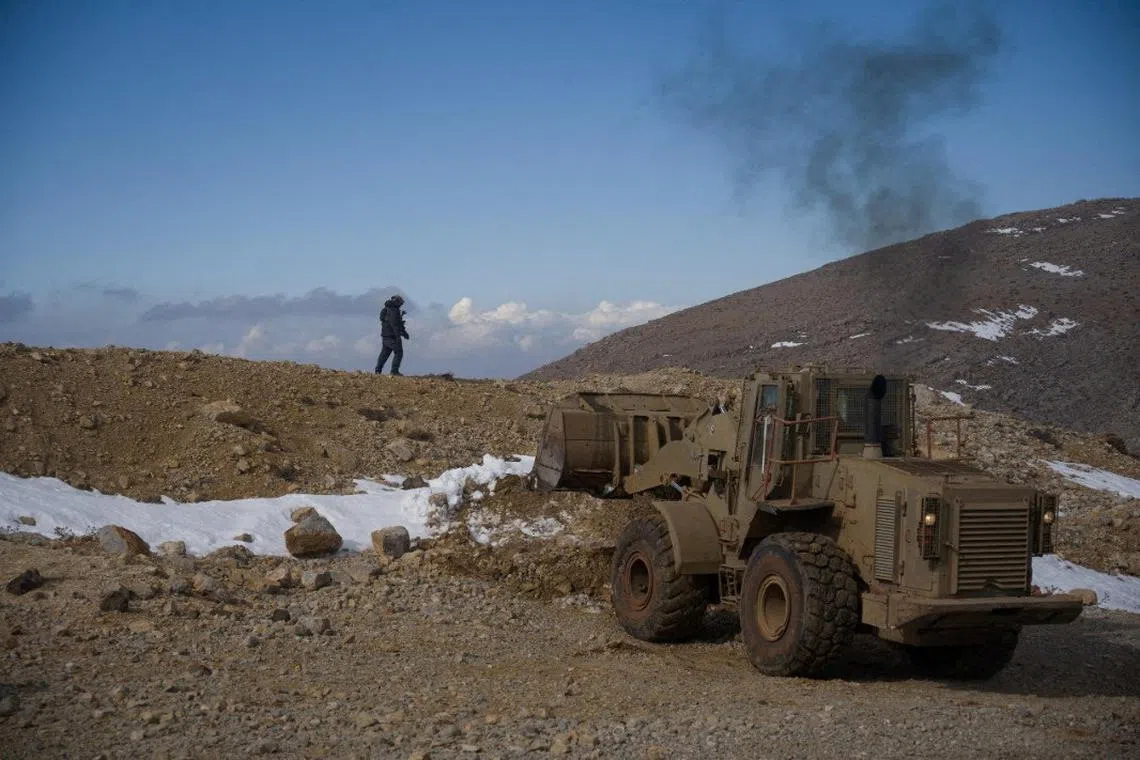 Israeli forces operating at a location given as Mount Hermon region in Syria on Dec 9.