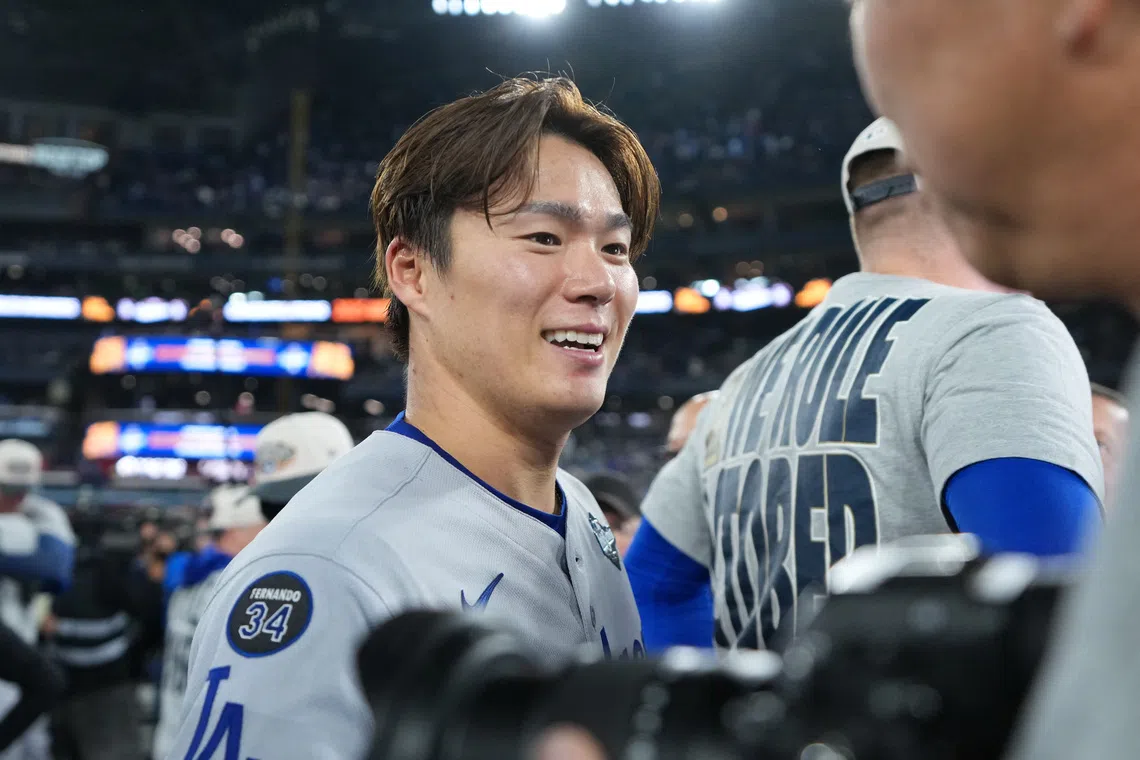 Nov 1, 2025; Toronto, Ontario, CAN; Los Angeles Dodgers pitcher Yoshinobu Yamamoto (18) reacts after defeating the Toronto Blue Jays in the eleventh inning for game seven of the 2025 MLB World Series at Rogers Centre. Mandatory Credit: Nick Turchiaro-Imagn Images