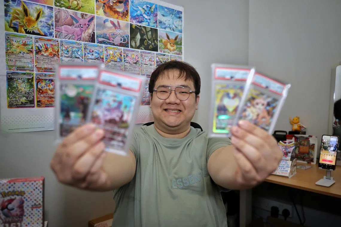 ST20250329_202538800876/dlpokemon/Taryn Ng/Dillon Loh// Profile of Mr Ang Bin Xiu, 31, a live-streamer who opens Pokémon card packs as a full-time job at his streaming studio on March 29, 2025. Mr Ang started in 2022 and has collected several rare cards, with the rarest one valued at US$1,800. ST PHOTO: TARYN NG