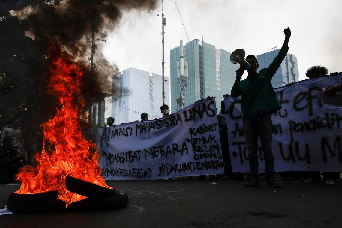 University students take part in 'Dark Indonesia' protests near the presidential palace in Jakarta on Feb 20.