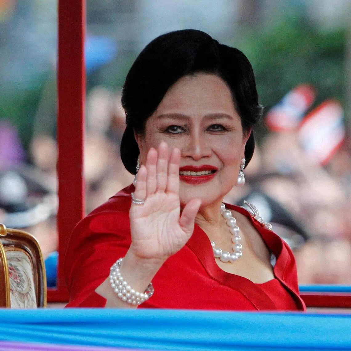 The late Thai Queen Sirikit waves to people during her arrival in Chinatown for Lunar New Year celebrations in Bangkok on Jan 23, 2012. She died on Oct 24, aged 93.