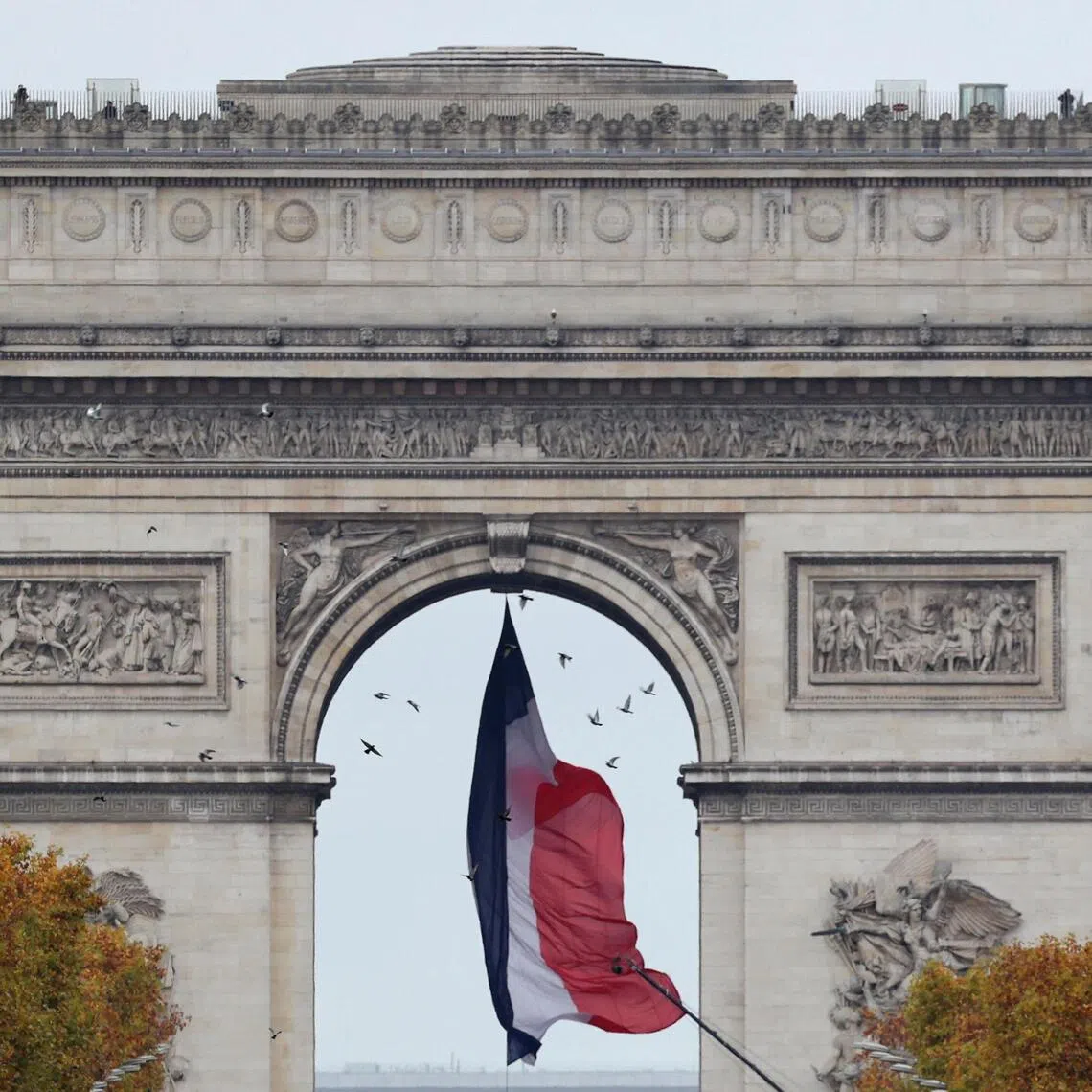 A 40-year-old Russian man was seen on video surveillance footage putting up pro-Russian posters on the Arc de Triomphe in Paris.