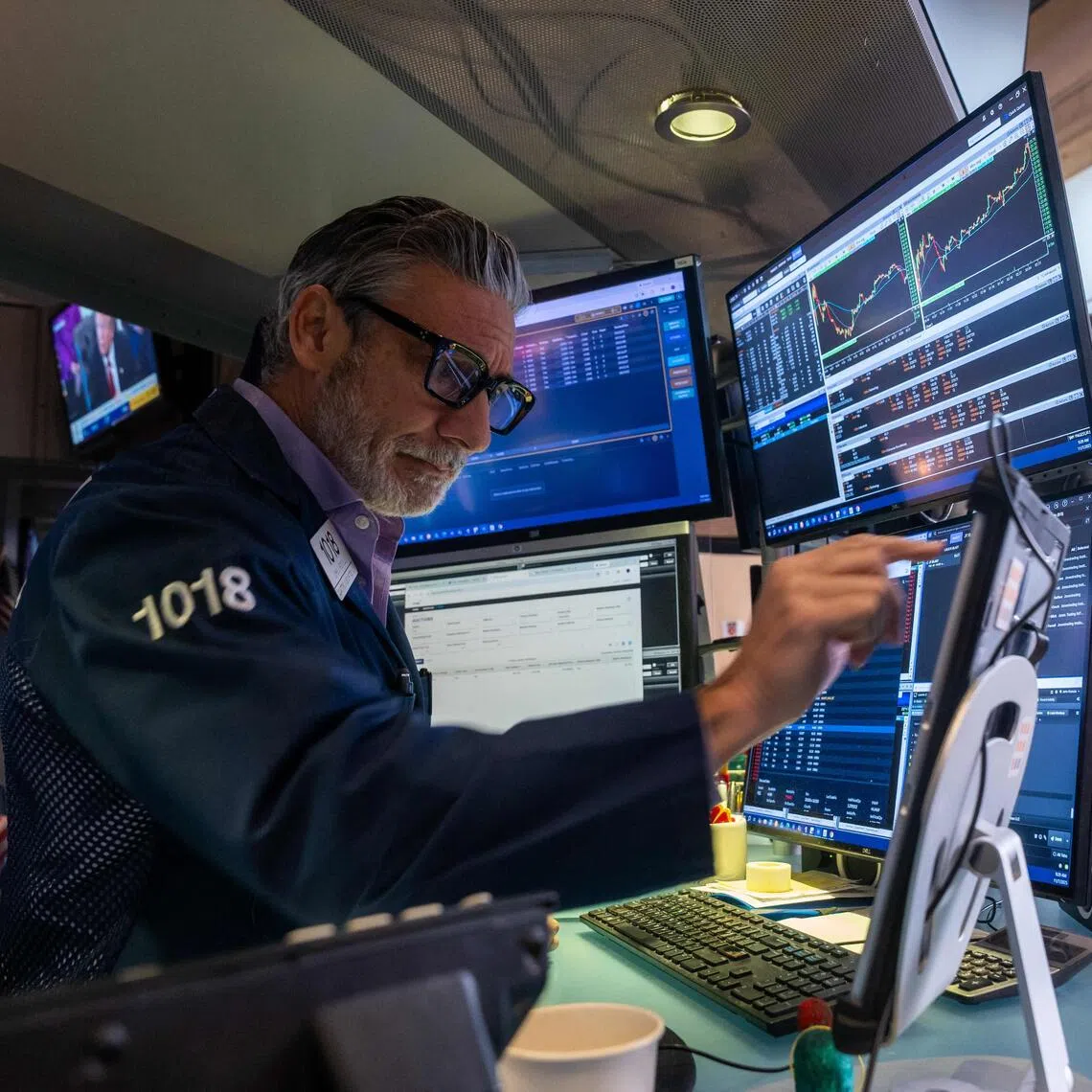 Traders working on the floor of the New York Stock Exchange on Nov 7, in New York City.