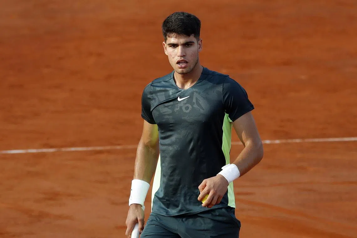 Spain's Carlos Alcaraz in action against Borna Coric of Croatia.