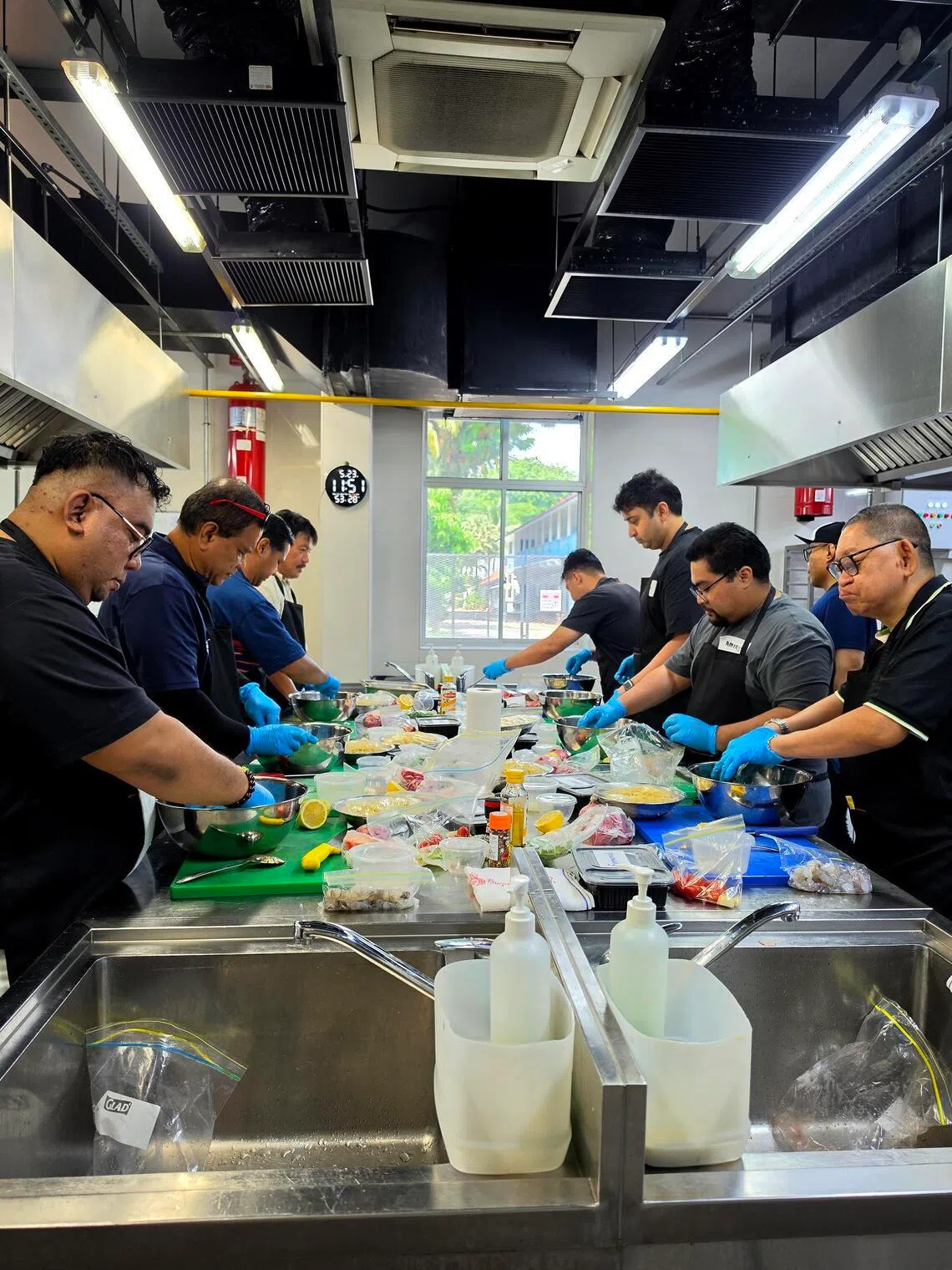 At the cooking session organised by Fellowship of Men Singapore, participants cooked a surprise meal for their loved ones.