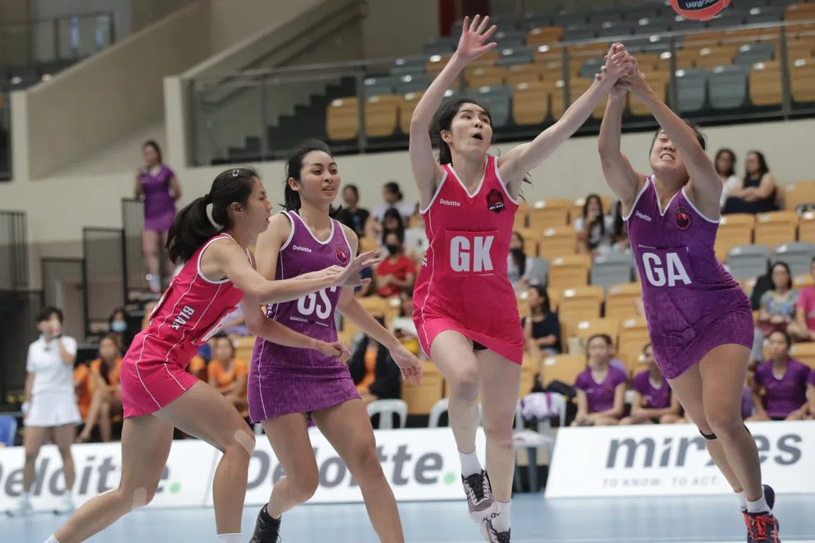 (from right) Sneakers Stingrays' Toh Kai Wei and Blaze Dolphins' Yew Shu Ning in action during the opening match of the Deloitte Netball Super League 2023. The Stingrays won 51-49.