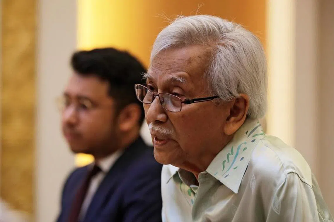 FILE PHOTO: Malaysia's new government advisor Daim Zainuddin speaks during a meeting with Chinese Foreign Minister Wang Yi at the Ministry of Foreign Affairs in Beijing, China Wednesday, July 18, 2018. Andy Wong/Pool/via Reuters/File Photo