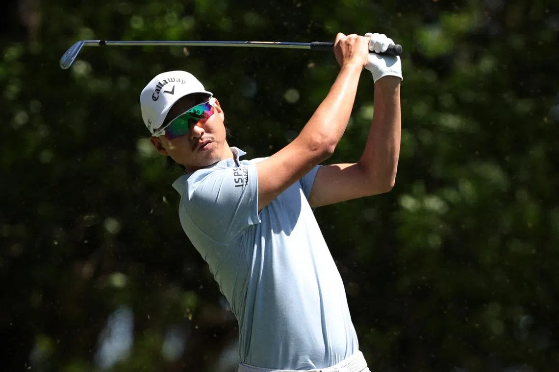 FILE PHOTO: Golf - The Masters - Augusta National Golf Club, Augusta, Georgia, U.S. - April 12, 2024 Australia's Min Woo Lee hits his tee shot on the 4th hole during the second round
