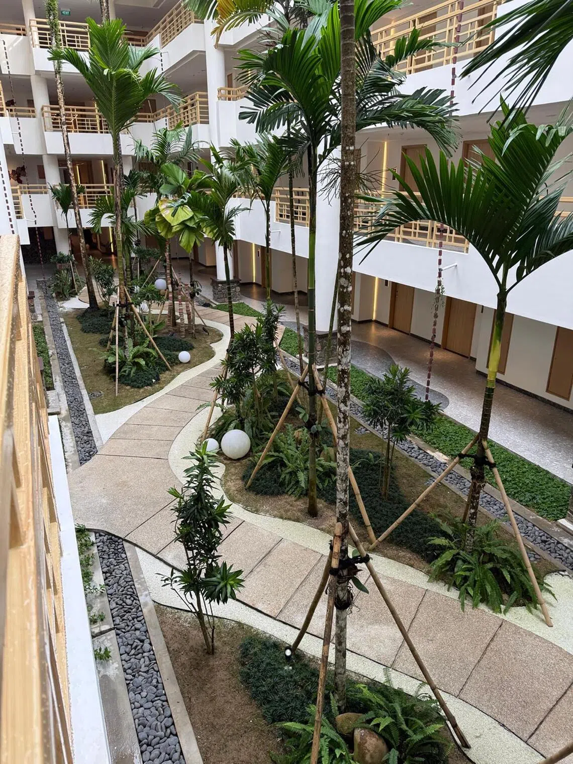 Lush greenery surrounds the resort’s accommodation blocks.