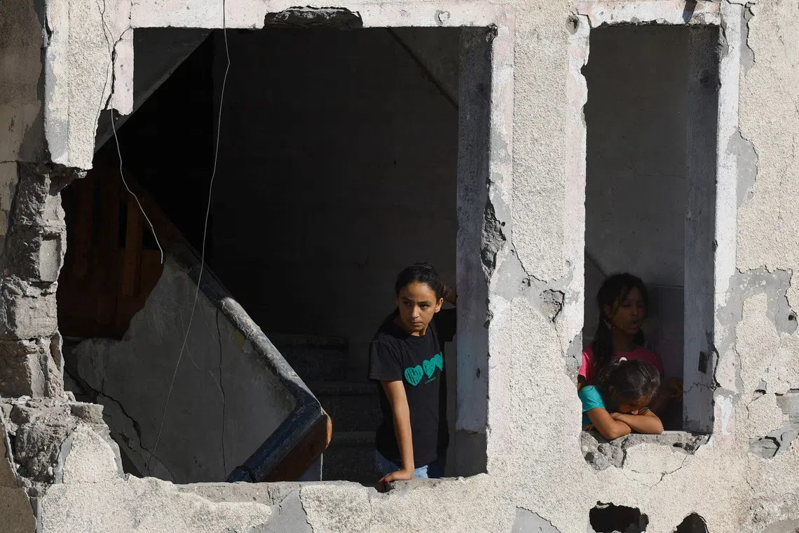 Race to evacuate war-damaged Gaza buildings after deadly apartment block collapse