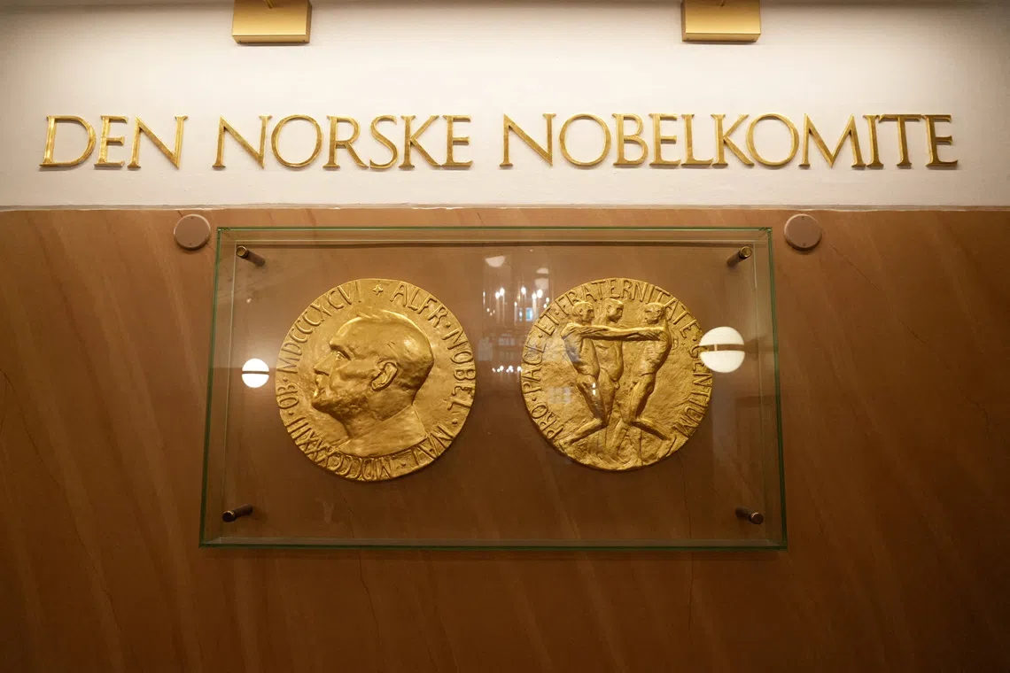 FILE PHOTO: A sign for the Norwegian Nobel Institute is seen on a wall inside the institute's building in Oslo, Norway, September 9, 2025. REUTERS/Tom Little/File Photo
