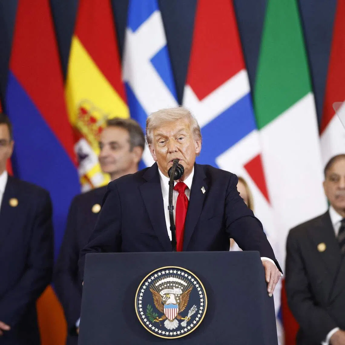 US President Donald Trump delivers a statement during a summit on Gaza in Sharm el-Sheikh on October 13, 2025. US President Donald Trump hailed a "tremendous day for the Middle East" as he and regional leaders signed a declaration on October 13, 2025 meant to cement a ceasefire in Gaza, hours after Israel and Hamas exchanged hostages and prisoners. (Photo by Yoan VALAT / POOL / AFP)