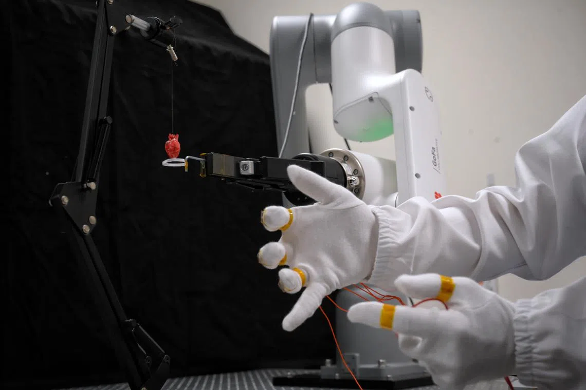 Soft, flexible circuits in the smart glove enable the accurate tracking of muscular movements, such as subtle twitches.