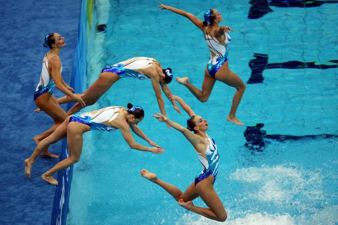 FILE PHOTO: General Sport - Beijing 2008 Olympic Games - Beijing, China - 23/8/08 
Synchronised Swimming - Russia leap into the water to begin their routine 
Mandatory Credit: Action Images / Jason O'Brien 
Livepic /File Photo