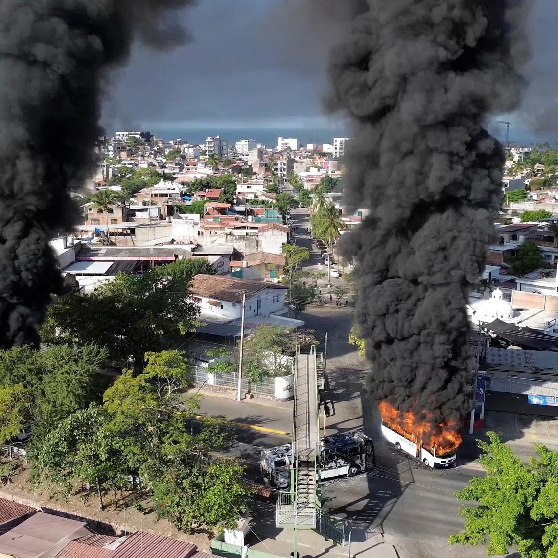 Smoke billows after a military operation in which Mexican drug lord Nemesio Oseguera, known as "El Mencho," was killed, on Feb 22.
