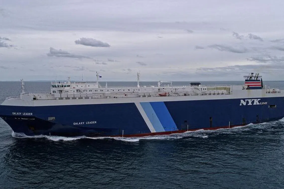 FILE PHOTO: A view of the British-owned and Japanese-operated cargo ship Galaxy Leader, which was reported to have been captured by Houthis in the southern Red Sea, in this handout image taken near Queensland, Australia November 27, 2018. Owen Foley/Handout via REUTERS/File photo