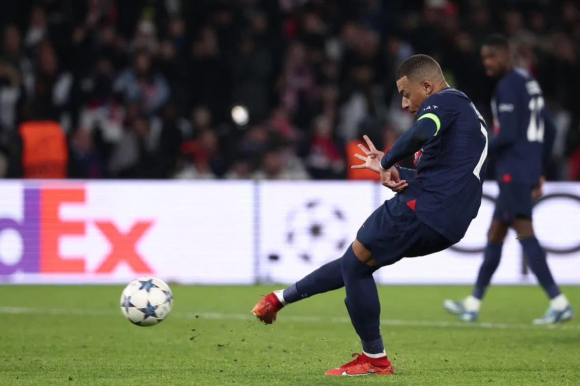 Kylian Mbappe scoring a penalty to earn Paris Saint-Germain a 1-1 Champions League draw with Newcastle United.