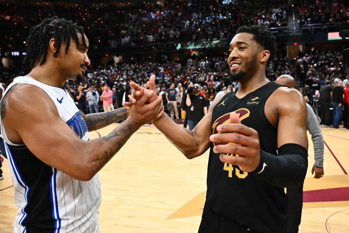 Donovan Mitchell (right) of the Cleveland Cavaliers with Orlando Magic's Gary Harris during the fourth quarter in Game 7 of the Eastern Conference first round play-offs at Rocket Mortgage Fieldhouse on May 5. The Cavaliers defeated the Magic 106-94. 