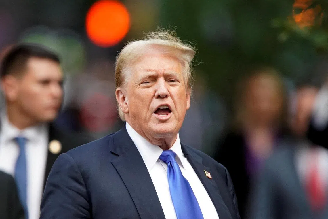 FILE PHOTO: Former U.S. President Donald Trump walks outside Trump Tower after the verdict in his criminal trial over charges that he falsified business records to conceal money paid to silence porn star Stormy Daniels in 2016, in New York City, U.S. May 30, 2024. REUTERS/Eduardo Munoz/ File Photo/File Photo