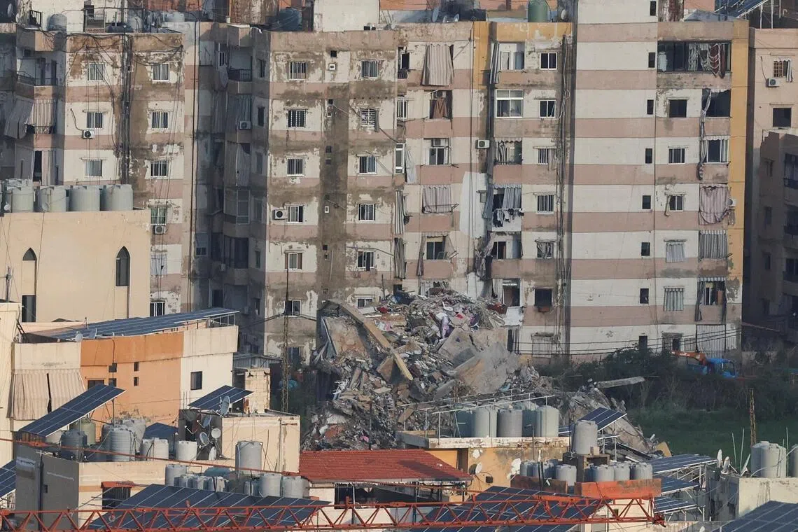 Debris and damaged buildings in the aftermath of Israeli strikes in Beirut's southern suburbs, Lebanon.