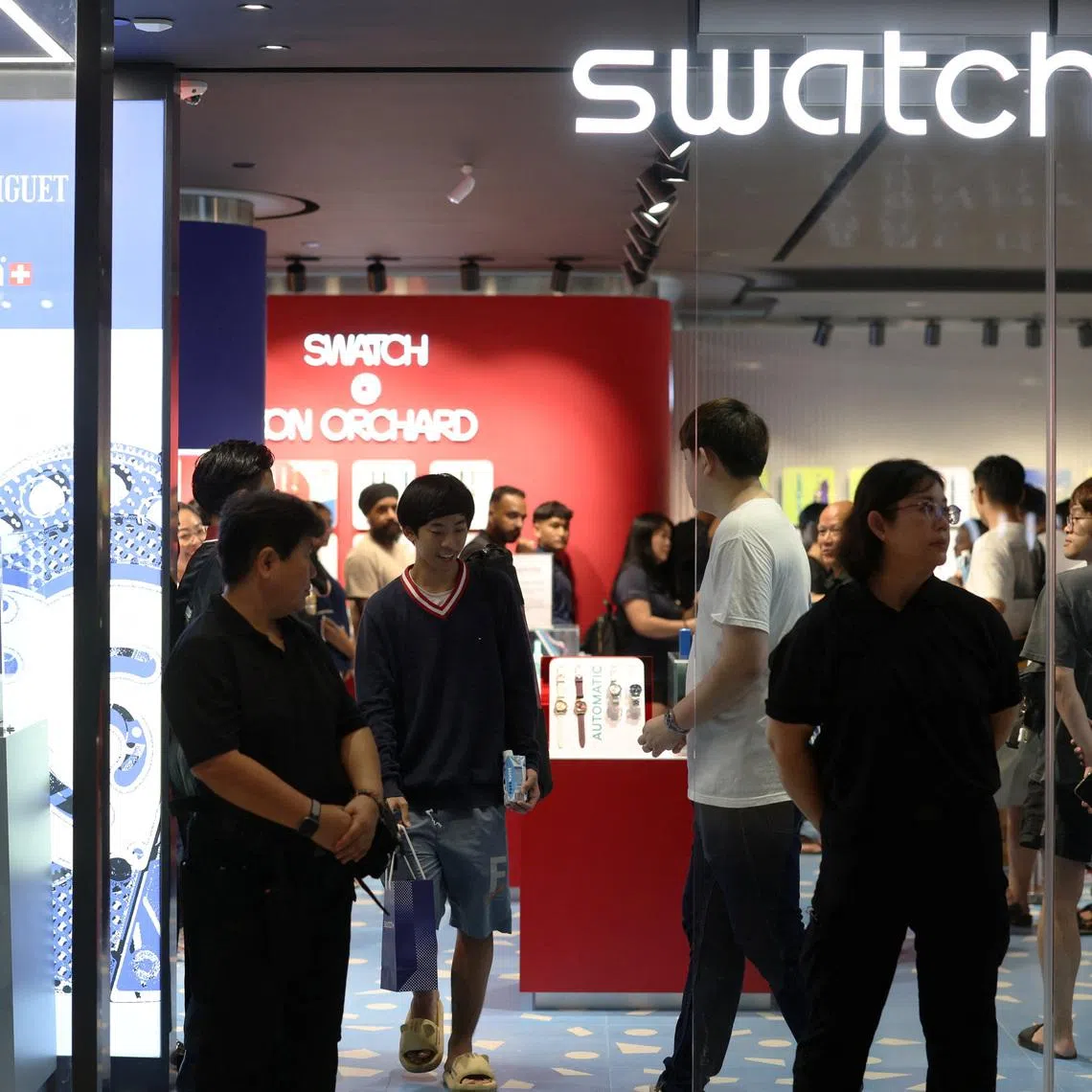 Shoppers at the Audemars Piguet x Swatch “Royal Pop” launch at ION Orchard on May 16. Swatch said its VivoCity store would remain closed on May 16 in view of public safety considerations.