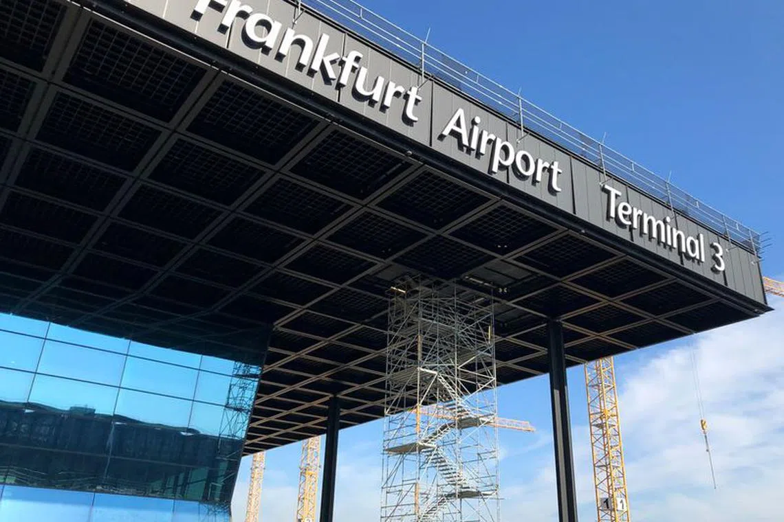 Staff works on the completion of Terminal 3 at Frankfurt Airport, Germany, September 27, 2023.    REUTERS/Ilona Wissenbach/file photo