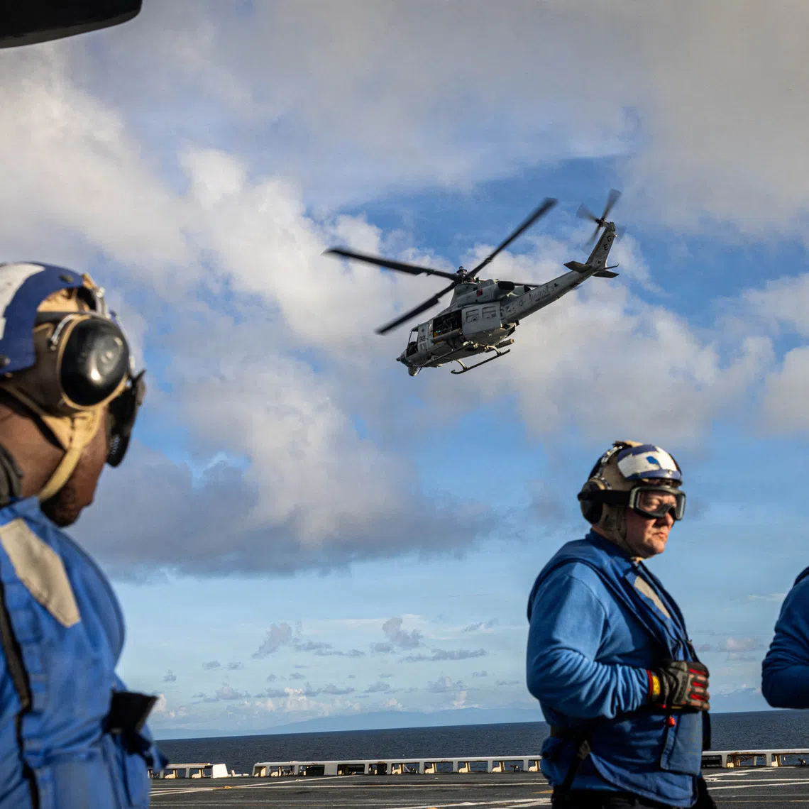 A U.S. Marines UH-1Y Venom helicopter takes off from the U.S. Navy San Antonio-class amphibious transport dock USS Fort Lauderdale while underway in the Caribbean Sea, November 17, 2025.   Sgt. Nathan Mitchell/U.S. Marine Corps/Handout via REUTERS  THIS IMAGE HAS BEEN SUPPLIED BY A THIRD PARTY